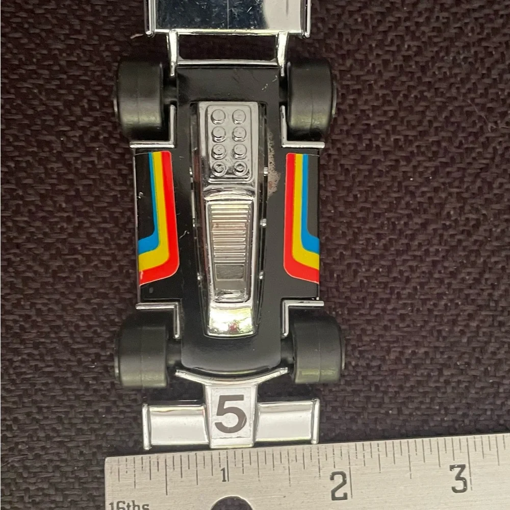 VTG 1979 Tonka black F1 race car w/ rainbow racing stripes